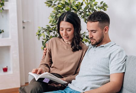 couple reading called to adoption resources Christian book